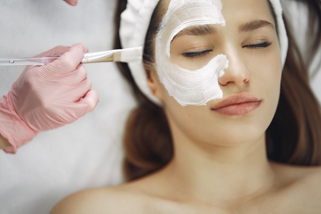 Facial mask application with brush