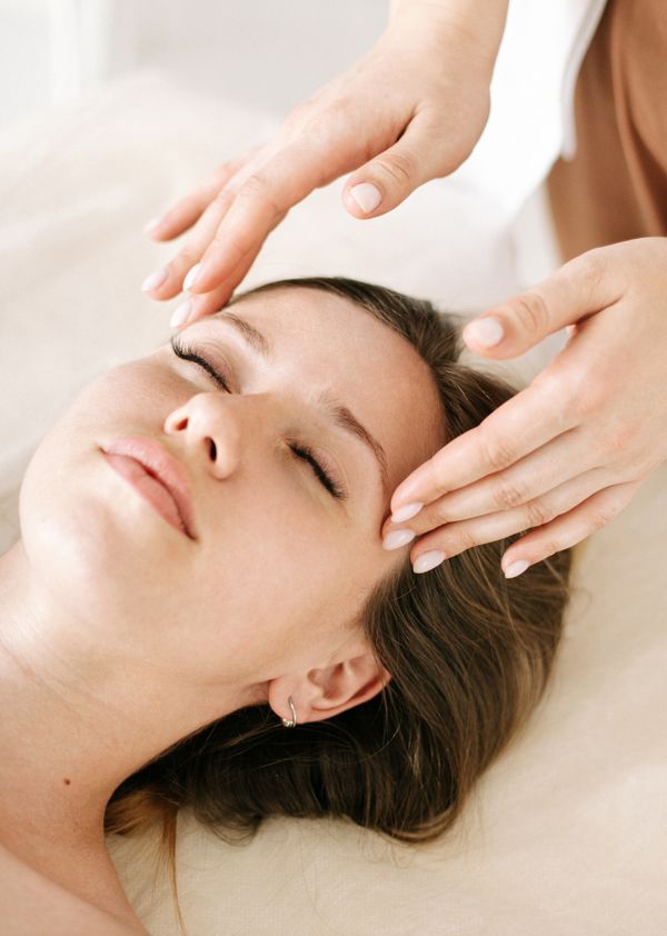 Relaxing facial massage in soft light